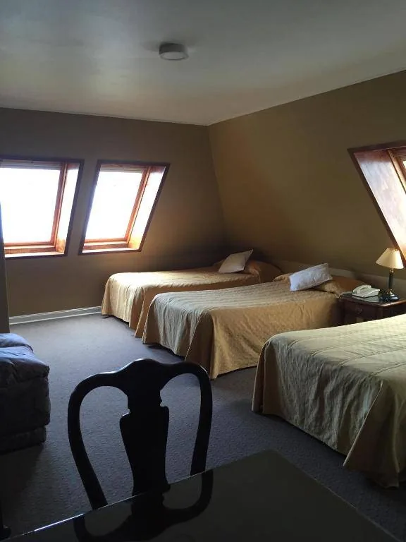 Triple room skylights floor 9 Puerto Montt Apart Hotel Colón